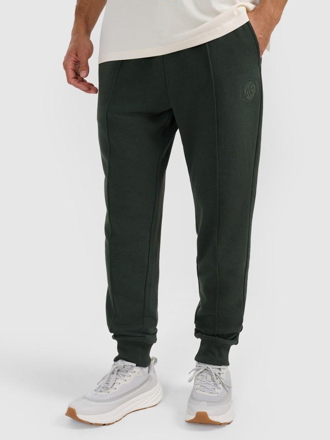 4F Spodnie dresowe joggery męskie - zielone M