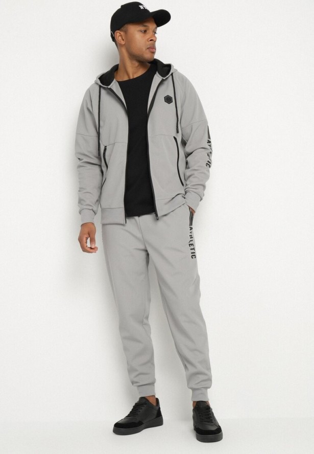 Szare Spodnie Dresowe Typu Jogger z Kieszeniami Zdobione Nadrukami Mepessa