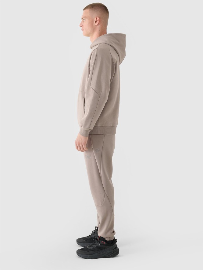 4F Spodnie dresowe joggery męskie 4F x Robert Lewandowski - beżowe L