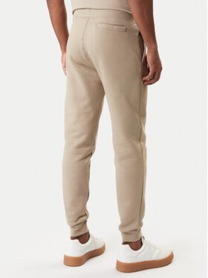 Guess Spodnie dresowe Z2YB22 K9V31 Beżowy Regular Fit