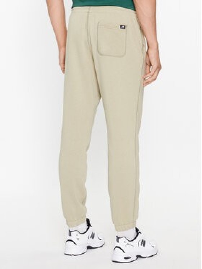 New Balance Spodnie dresowe NB Essentials Sweatpant MP33509 Zielony Regular Fit