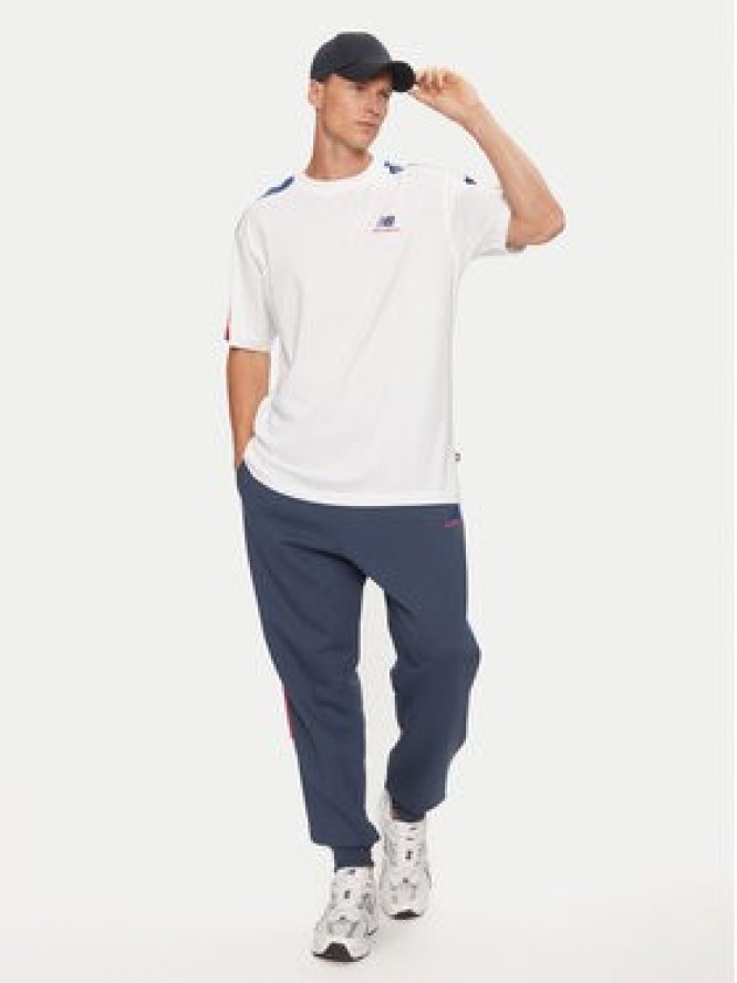 New Balance Spodnie dresowe MP43522NNY Niebieski Relaxed Fit