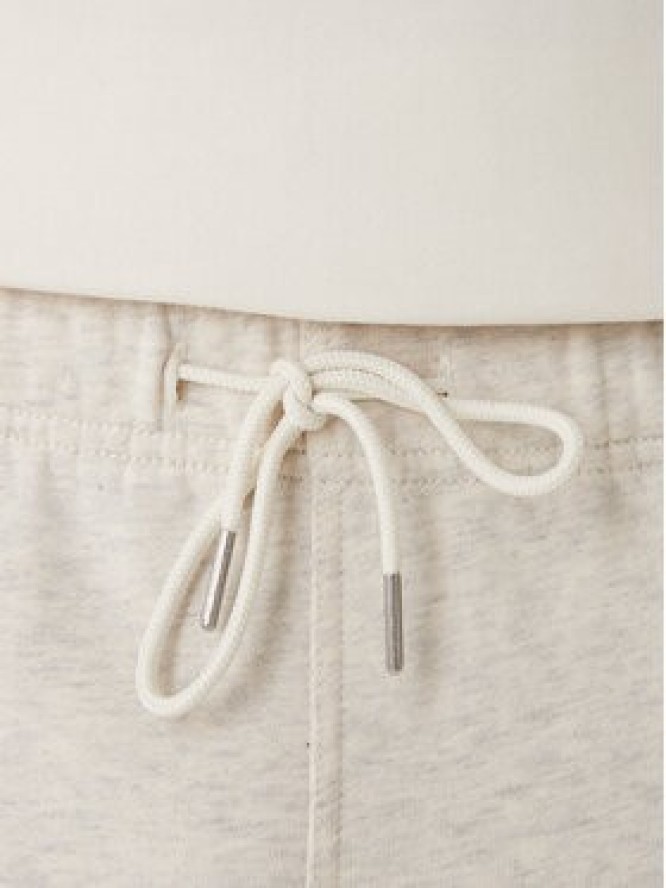 Calvin Klein Jeans Spodnie dresowe Embossed Monologo LV047F206G Beżowy Wide Leg