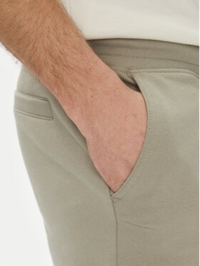 Calvin Klein Jeans Spodnie dresowe Painted J30J327535 Zielony Regular Fit