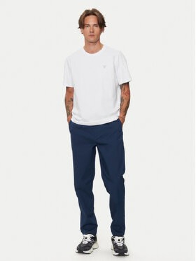 New Balance Spodnie materiałowe Athletics Standard MP43554NNY Granatowy Regular Fit