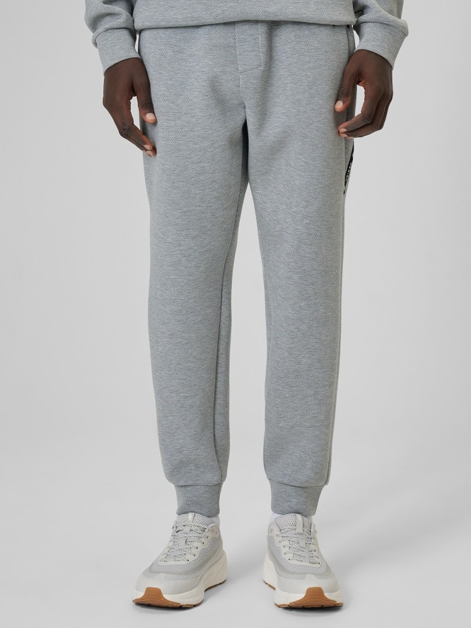 4F Spodnie dresowe joggery męskie - szare S