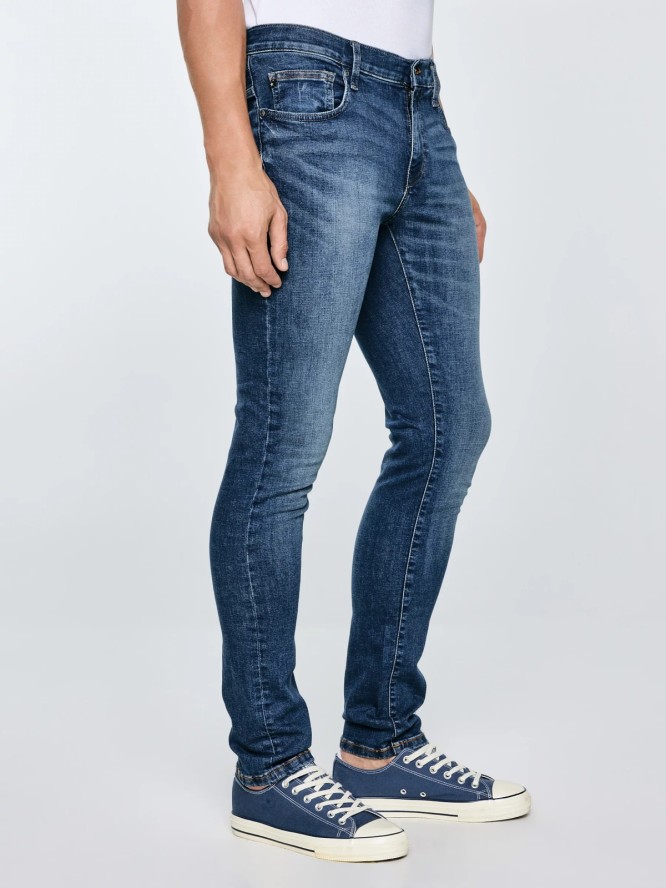 Jeansy męskie dopasowane z przetarciami granatowe Nader 495