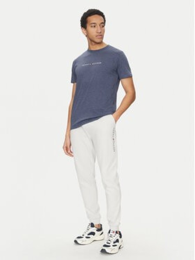 Tommy Hilfiger Spodnie dresowe UM0UM03348 Beżowy Regular Fit