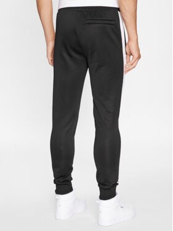 Puma Spodnie dresowe Iconic T7 530098 Czarny Regular Fit