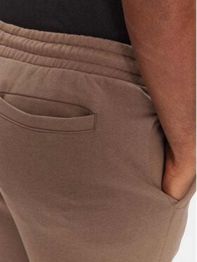 Puma Spodnie dresowe Ess 629651 Brązowy Relaxed Fit