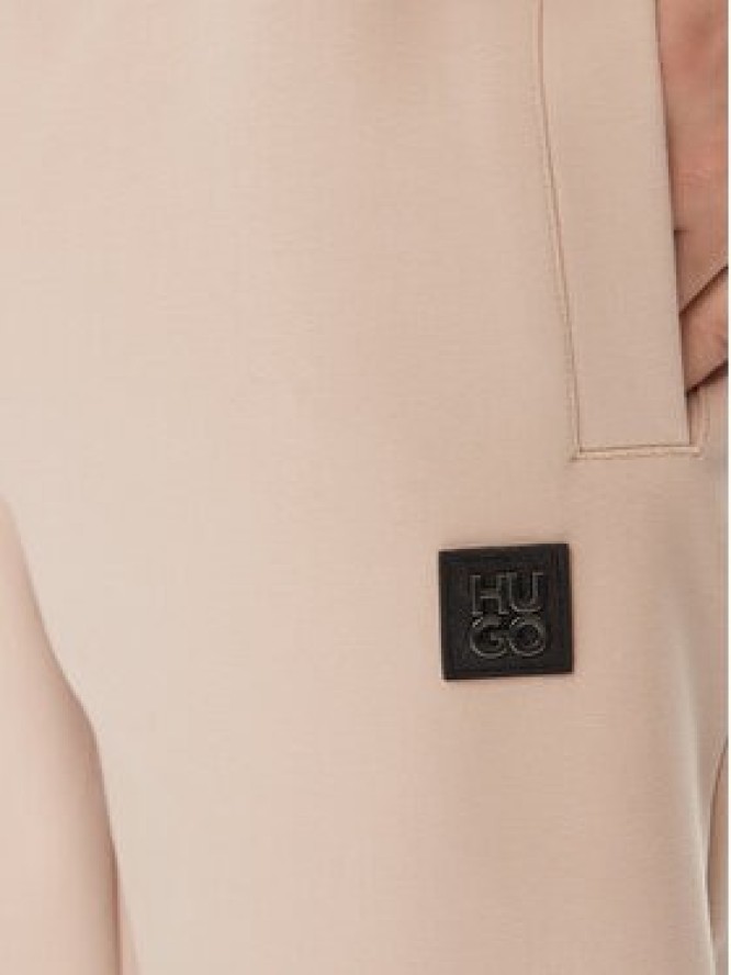 Hugo Spodnie dresowe Dimacs 50509457 Beżowy Relaxed Fit