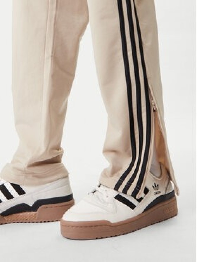 adidas Spodnie dresowe Firebird KE6679 Beżowy Loose Fit