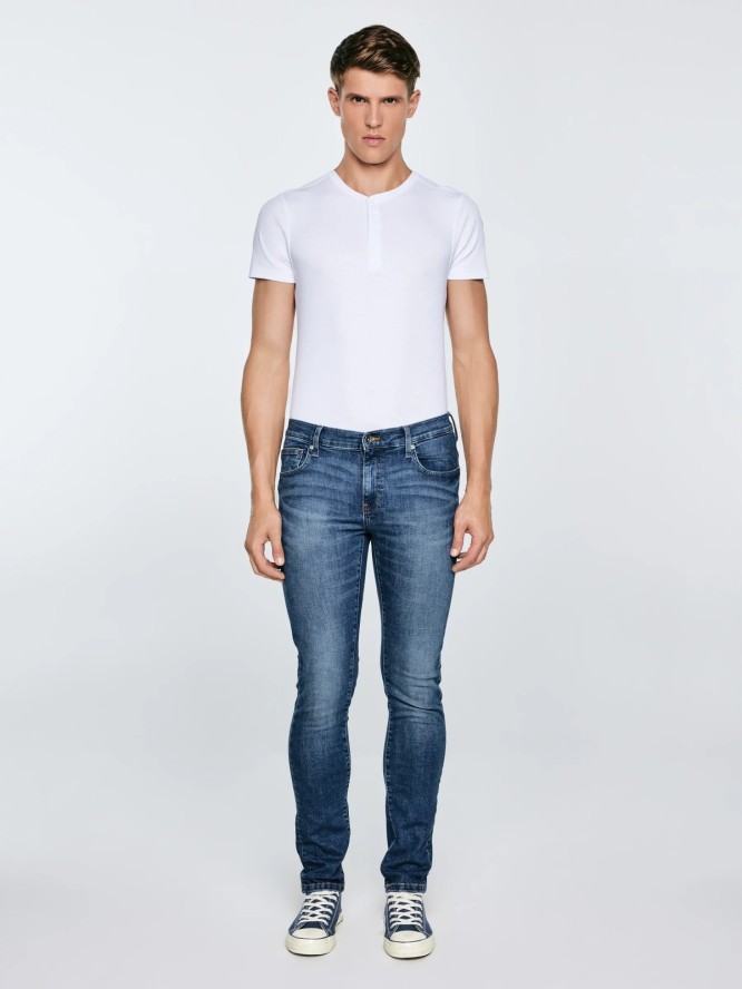 Jeansy męskie dopasowane z przetarciami granatowe Nader 495