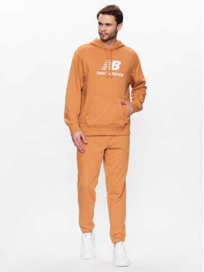 New Balance Spodnie dresowe MP31539 Żółty Regular Fit