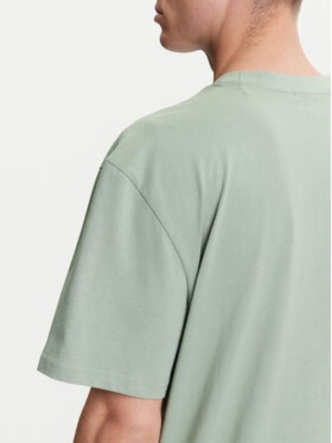 Karl Kani T-Shirt PD00005357 Zielony Relaxed Fit