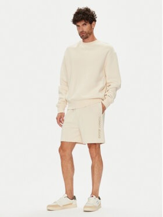 Tommy Jeans Szorty sportowe New Classic Beach DM0DM21781 Beżowy Relaxed Fit