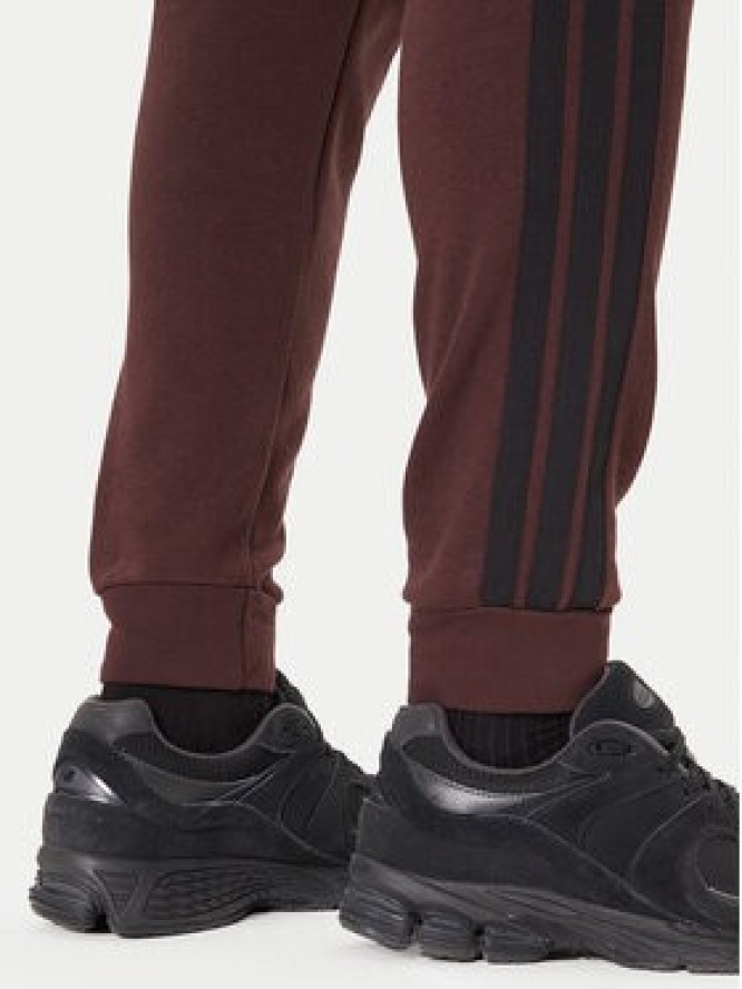 adidas Spodnie dresowe Essentials 3-Stripes JX0749 Brązowy Regular Fit