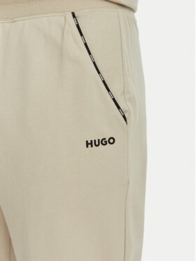 HUGO Spodnie dresowe Noah 50566158 Beżowy Regular Fit