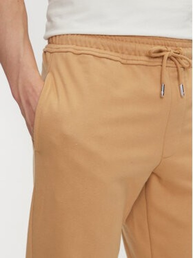 Timberland Spodnie dresowe TB0A5V5Q Beżowy Regular Fit