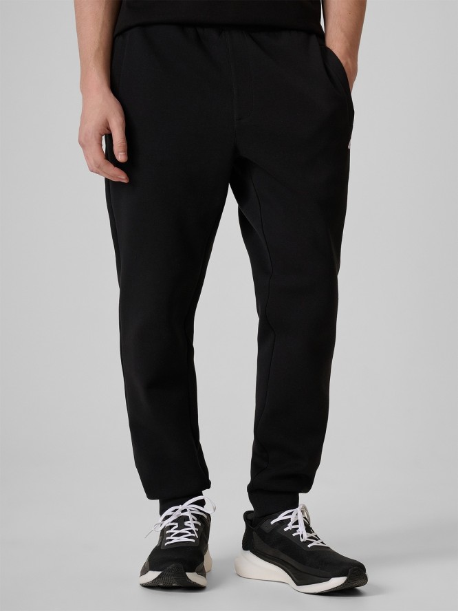 4F Spodnie dresowe joggery męskie - czarne M