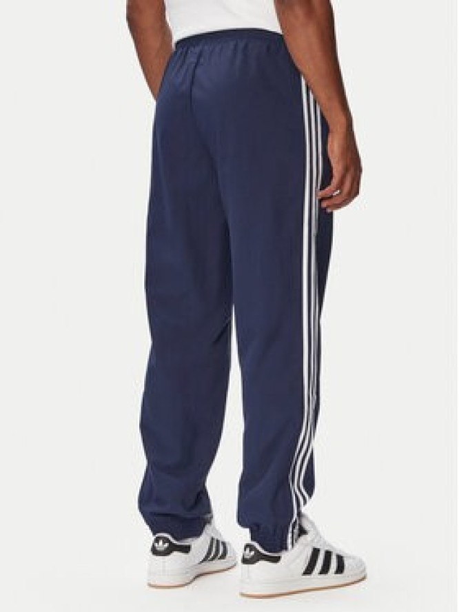 adidas Spodnie dresowe Firebird Woven KE1370 Granatowy Regular Fit
