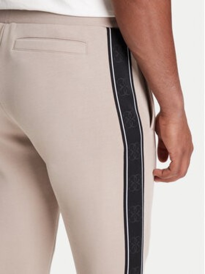 Guess Spodnie dresowe Z2YB09 KB3P2 Beżowy Regular Fit