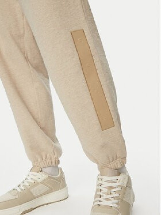 HUGO Spodnie dresowe Dalipant 50563100 Beżowy Relaxed Fit