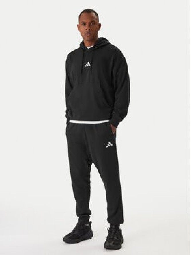 adidas Spodnie dresowe Essentials Feel Cozy JE3854 Czarny Regular Fit