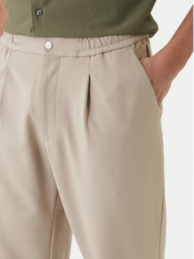 Calvin Klein Spodnie materiałowe LV04LF607G Beżowy Tapered Fit