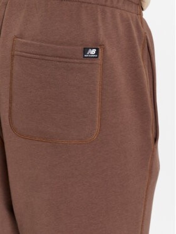 New Balance Spodnie dresowe NB Essentials Sweatpant MP33509 Brązowy Regular Fit