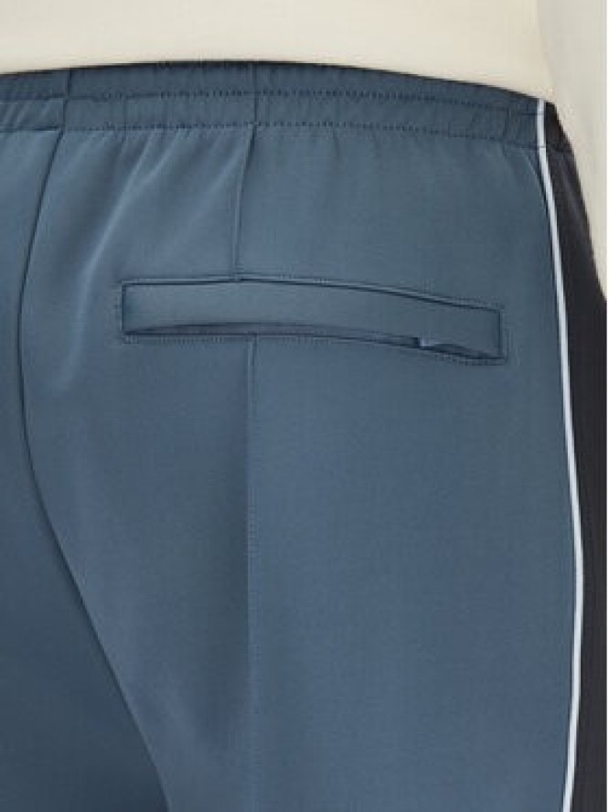 Converse Spodnie dresowe Retro Track 10027328-A01 Niebieski Regular Fit