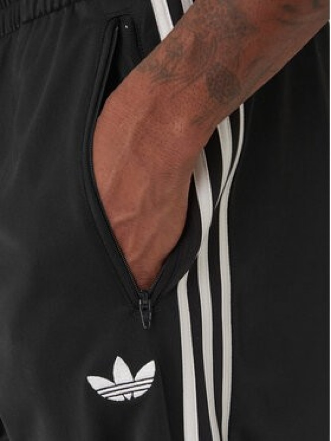 adidas Spodnie dresowe Firebird KD8315 Czarny Loose Fit