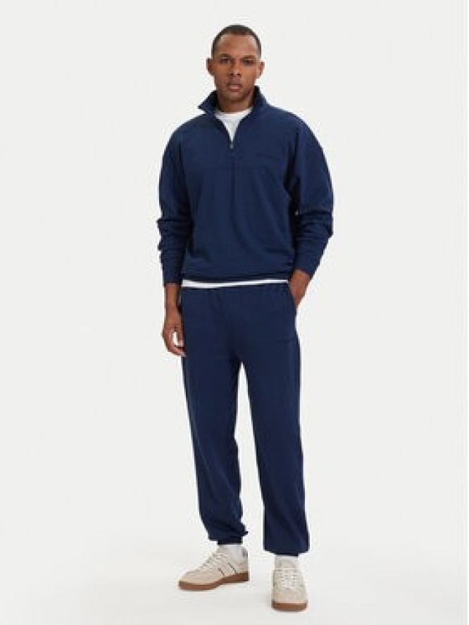 Tommy Hilfiger Spodnie dresowe Essential UM0UM03911 Granatowy Relaxed Fit