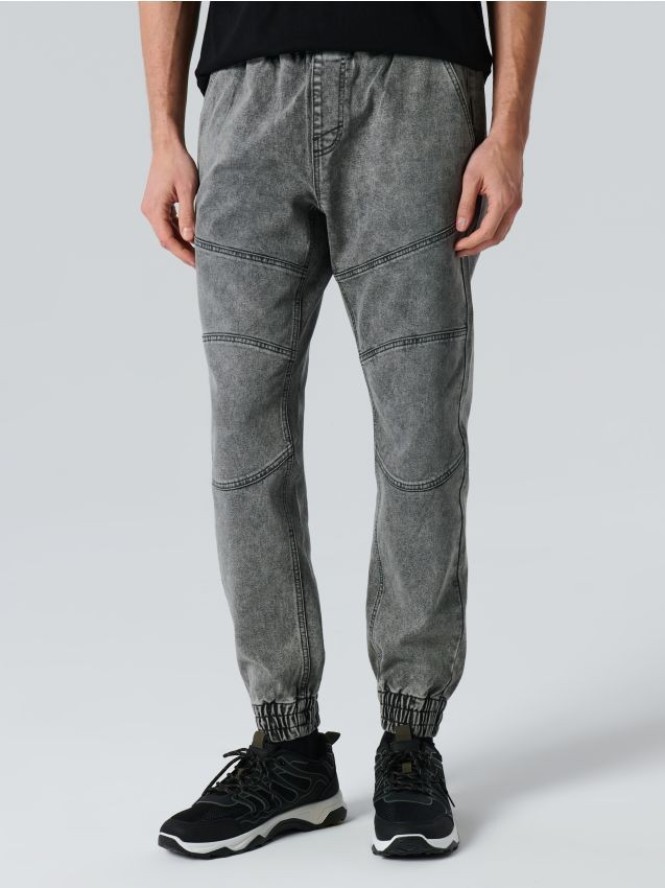 Jeansy jogger z efektem sprania - szary
