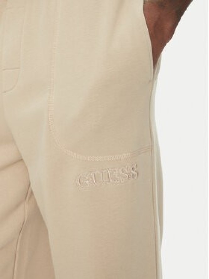 Guess Spodnie dresowe U5RB00 KCO31 Beżowy Regular Fit