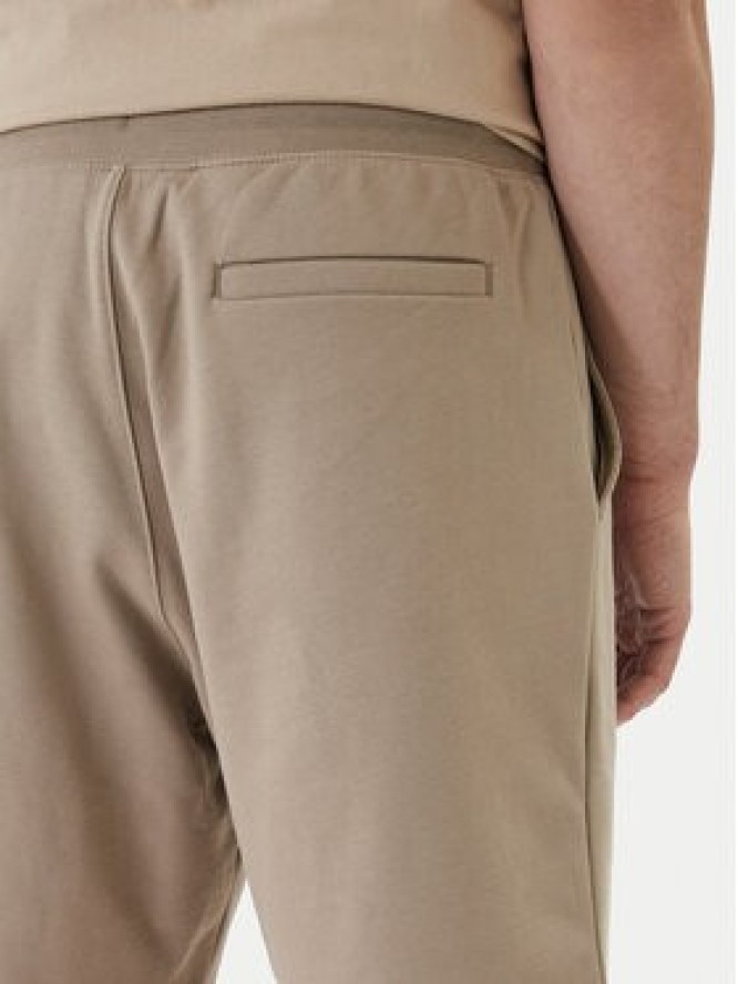 Tommy Hilfiger Szorty sportowe Logo MW0MW43068 Beżowy Regular Fit