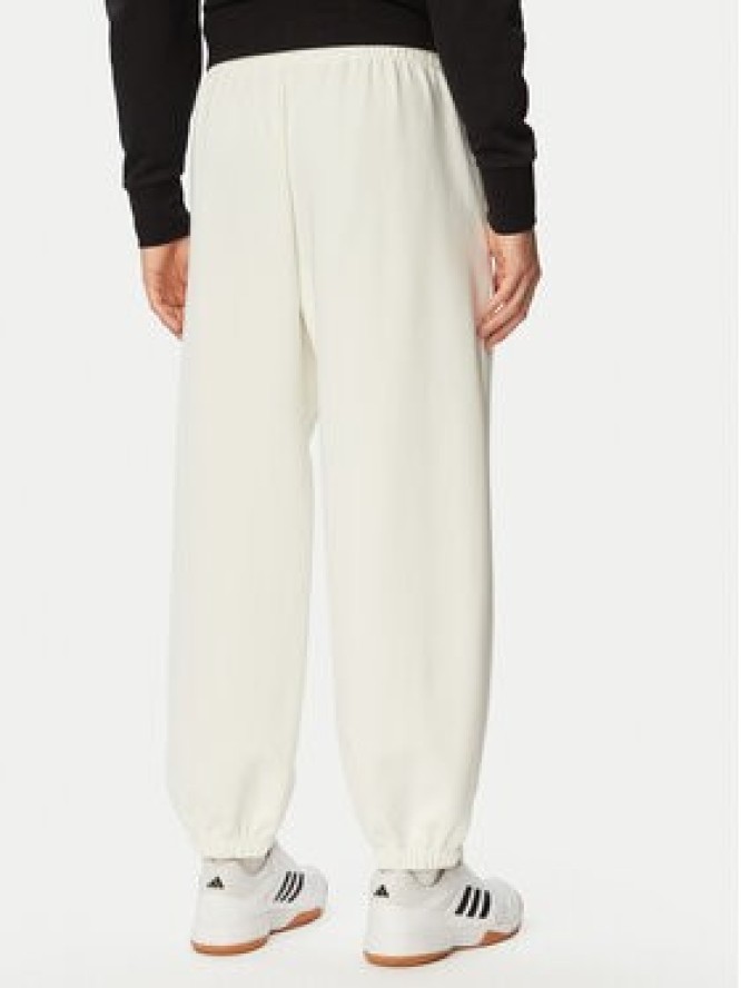 adidas Spodnie dresowe Soft Lux KF8574 Kremowy Regular Fit