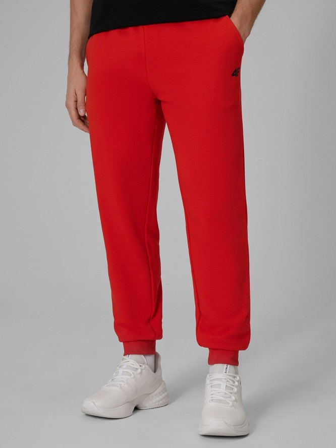 4F Spodnie dresowe joggery męskie - pomarańczowe S