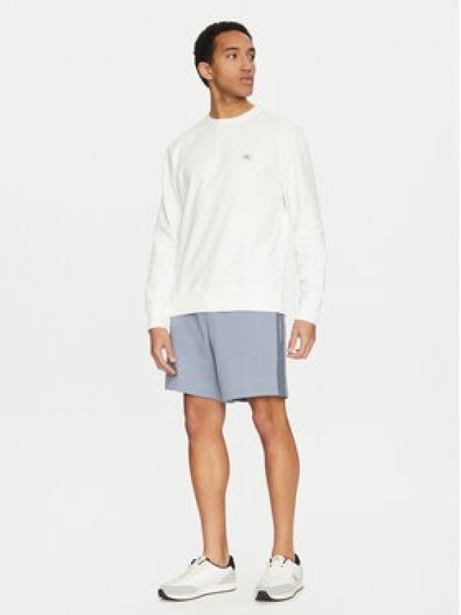 Calvin Klein Jeans Szorty sportowe J30J327246 Niebieski Relaxed Fit