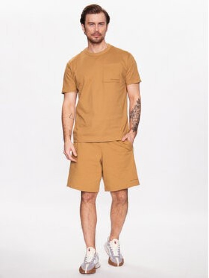 New Balance Szorty sportowe Athletics MS23550 Pomarańczowy Relaxed Fit