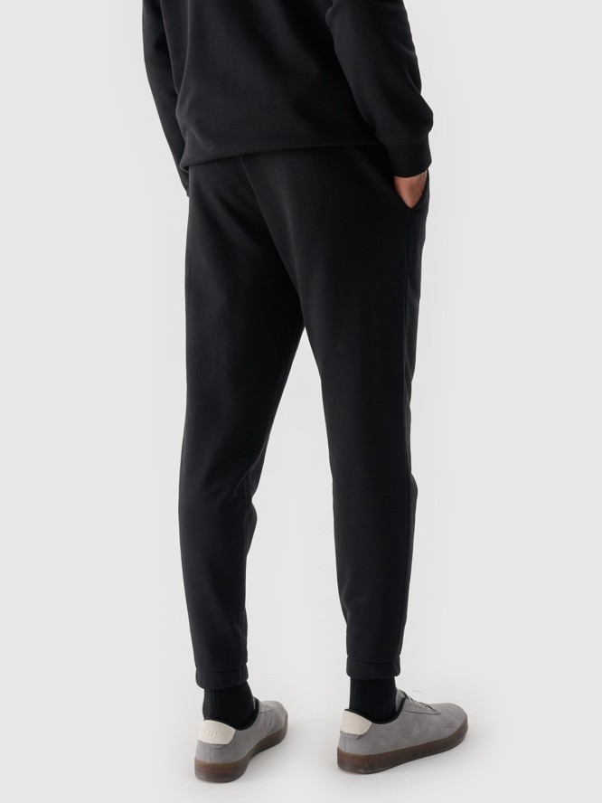 4F Spodnie dresowe joggery męskie - czarne XL