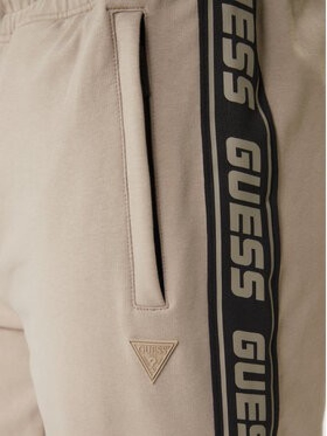 Guess Spodnie dresowe Z2YB19 K6ZS1 Beżowy Regular Fit