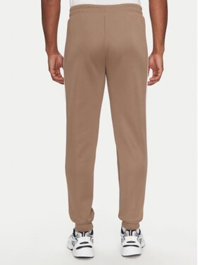 Puma Spodnie dresowe T7 Always On 629588 Brązowy Regular Fit