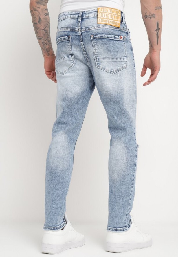 Niebieskie Jeansy Bawełniane o Dopasowanym Fasonie z Przetarciami i Dziurami Agistrea