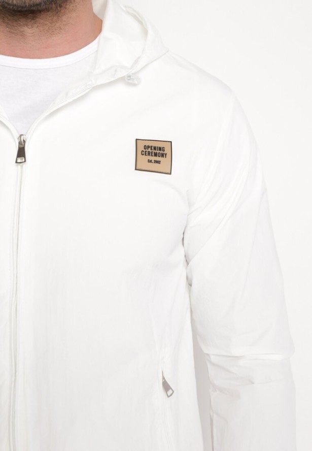 Biała Kurtka Wiatrówka z Naszywką i Kapturem Favema