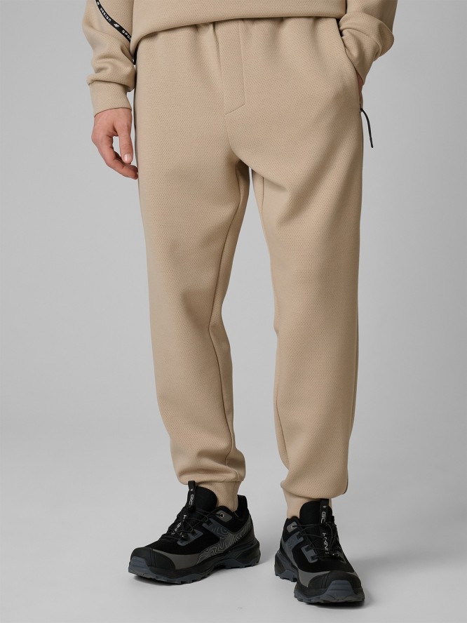 4F Spodnie dresowe joggery męskie - beżowe XXL