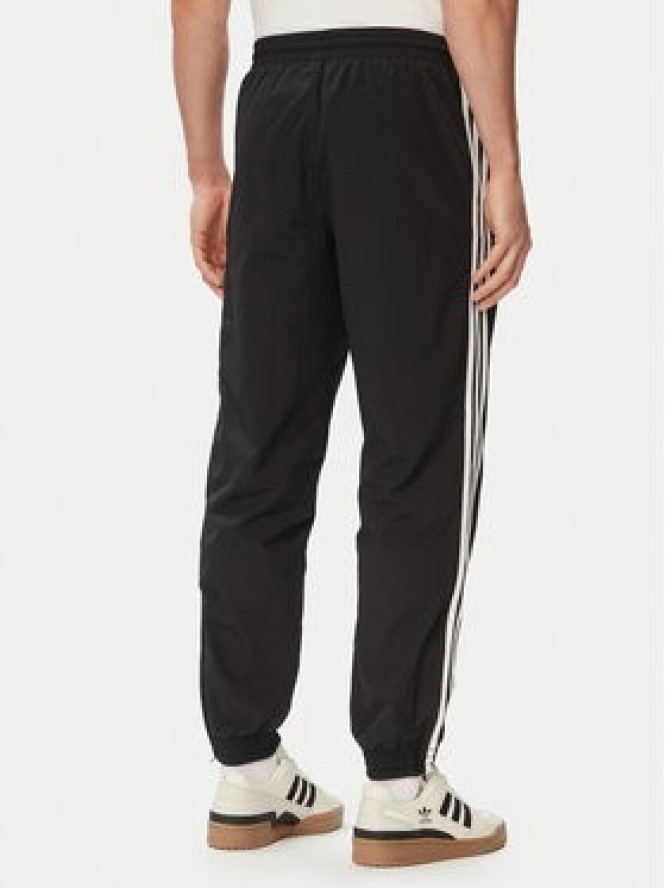 adidas Spodnie dresowe Firebird Woven KE1371 Czarny Regular Fit