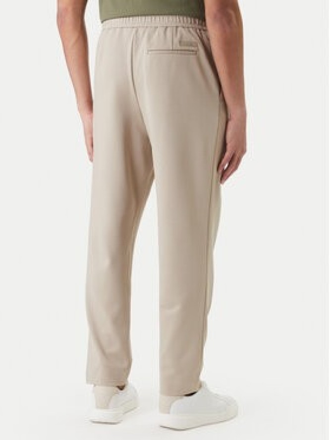 Calvin Klein Spodnie materiałowe LV04LF607G Beżowy Tapered Fit