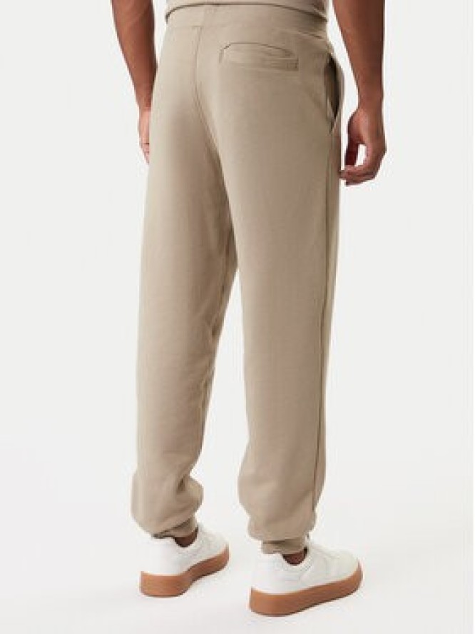 Guess Spodnie dresowe Z6RB12 KAIJ1 Beżowy Regular Fit