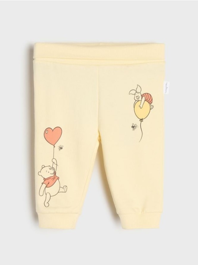 Spodnie dresowe jogger Winnie the Pooh - żółty